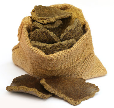 Mustard oil cake in a sack bag