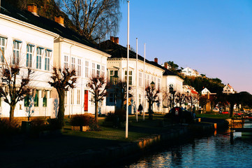 Naklejka premium Street with old port buildings along the wharf