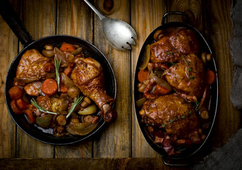 chicken with mushrooms and vegetables, stewed in wine.