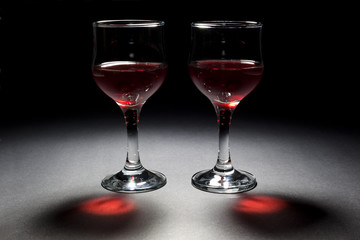 Two Glasses of Red Wine and Their Interesting Reflection