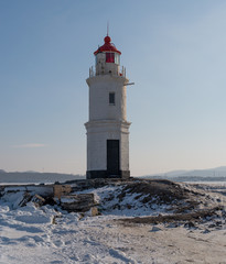 Fototapeta na wymiar Lighthouse in Vladivostok. Winter season.