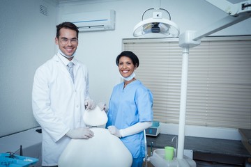 Portrait of smiling dentists