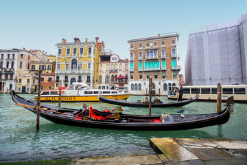 Fototapeta premium Water channell with gondolas in Venice