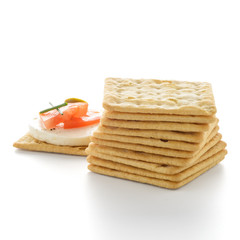 Crackers with cheese and tomato