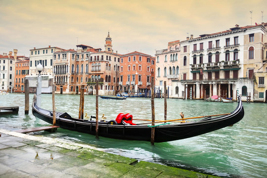 Empty gondola parked in Venice