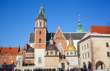 Obraz premium Tourists in the territory of the Wawel castle, Krakow, Poland