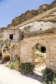 Urgup. Ruins of  facades of the old  "cave" city on the rocks