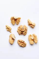 Pieces of Walnut on White