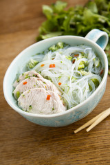 Asian chicken soup with rice noodles