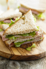 Ham, butter and green salad sandwiches