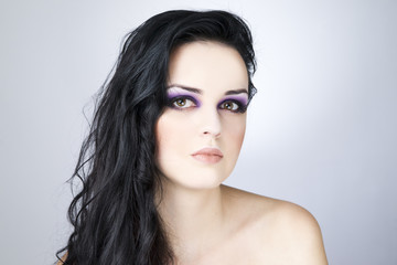 Fototapeta premium Professional makeup and hairstyle beautiful young woman close up