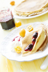 Pancakes with currant and kumquats jam