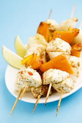 Vegetarian skewers with paneer cheese, capsicum and onion