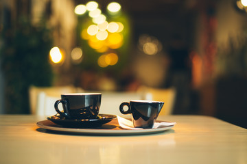 Obraz premium Cup of Cappuccino on wooden table. Cafe