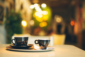 Obraz premium Cup of Cappuccino on wooden table. Cafe