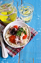 Salad with octopus, pasta and tomato