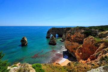 Cliffs and rock arch at Marinha