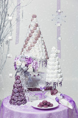 Big New Year's or wedding cake on lightly decorated background.