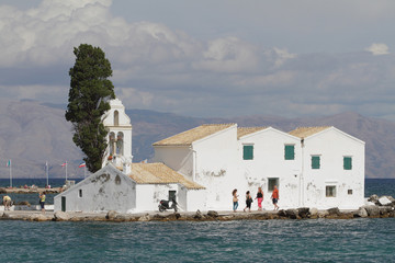 Church and monastery on island. Kanoni, Corfu, Greece