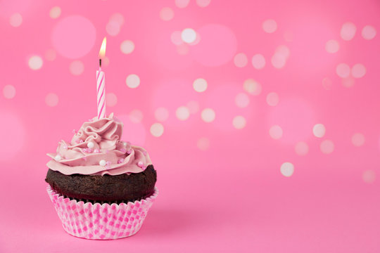 Pink birthday cupcake with lights