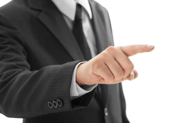 closeup businessman finger touching an imaginary screen Isolated