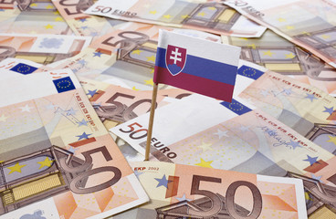 Flag of Slovakia sticking in 50 Euro banknotes.(series)