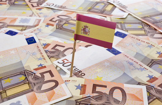 Flag of Spain sticking in 50 Euro banknotes.(series)