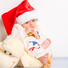little baby celebrates Christmas