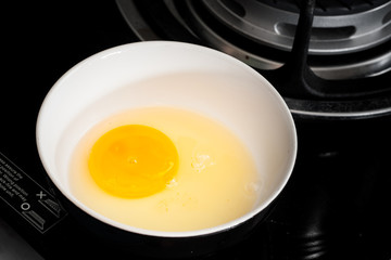raw egg in a bowl