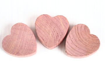 Little hearts made of Red Cedar wood.