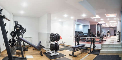 Modern gym interior with equipment - obrazy, fototapety, plakaty
