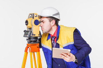 Worker looking into the level