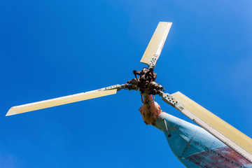 Turbine of russian transport helicopter against blue sky