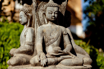 Fototapeta na wymiar Buddhist Sculpture Near Swayambhunath