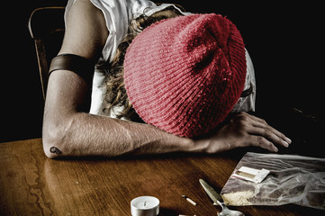 dramatic shot, teen heroin user - after shooting up - obrazy, fototapety, plakaty