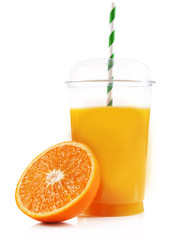 Orange juice in fast food closed cup with tube and slice of