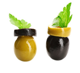 Green and black cut olive rings isolated on white