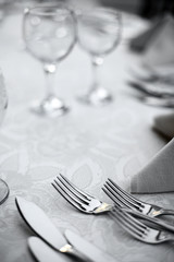 Forks and knives on a table