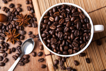 Still-life with a cup of coffee beans