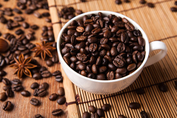 Still-life with a cup of coffee beans