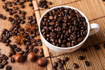 Still-life with a cup of coffee beans