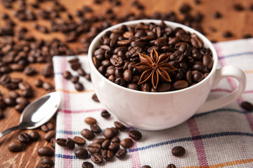 Still-life with a cup of coffee beans