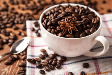Still-life with a cup of coffee beans