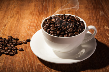 Still-life with a cup of coffee beans