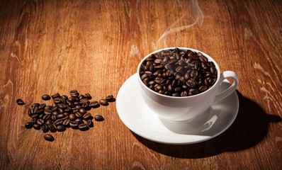 Still-life with a cup of coffee beans