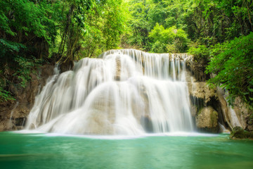 Fototapeta na wymiar Deep forest Waterfall in Kanchanaburi,Thailand