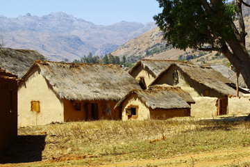 Fototapeta na wymiar Typical malgasy village - african hut, poverty in madagascar