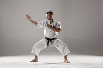 Man in white kimono training karate © master1305