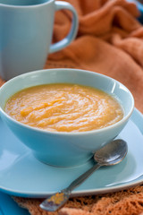 Dietary pumpkin porridge in the blue plate