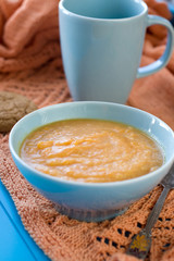 Dietary pumpkin porridge in the blue plate